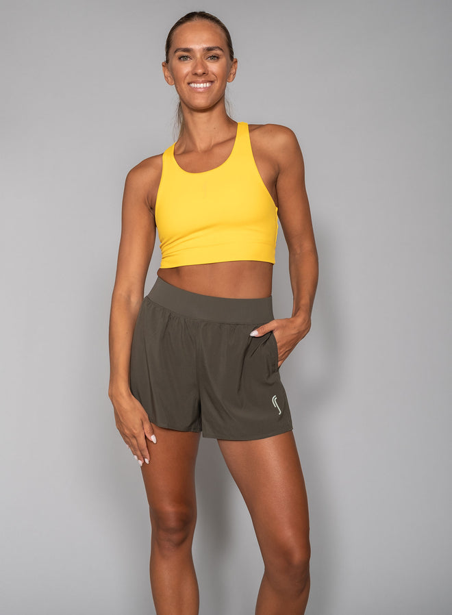 Women's Performance Court Shorts - 2 in 1 with ball pockets Deep green